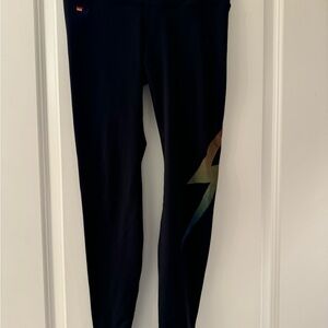Soft Aviator Nation long leggings. Black with a lightening bolt on one leg.